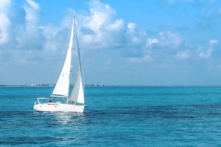 a boat in the middle of a body of water