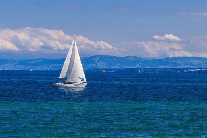 a small boat in a large body of water
