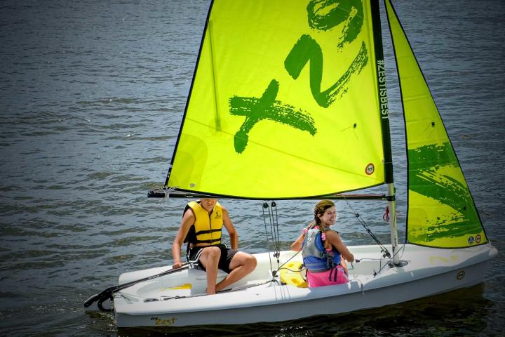 a small boat in a body of water