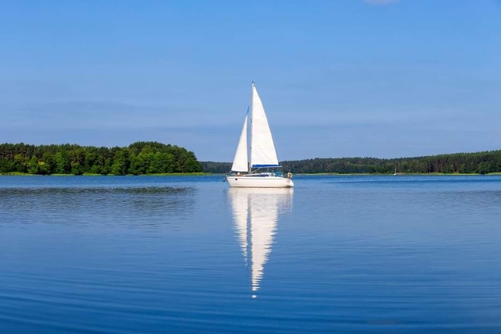 a small boat in a large body of water
